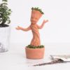 Dancing Groot Chia Pet from Guardians of the Galaxy Vol. 2. Each kit comes with a custom moulded Baby Groot pottery planter, convenient plastic drip tray, and enough chia seed packets for 3 plantings.